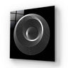 Black and white spiral pattern on decorative glass panel, modern architectural design