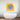 Vibrant yellow glass art panel with blue skull and purple cat, modern bathroom decor