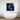 Vibrant abstract wall art above modern freestanding bathtub in luxury bathroom