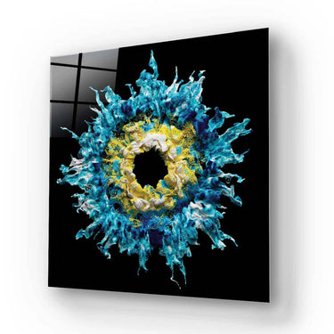 Bespoke decorative glass art with blue and yellow abstract design on black background