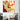 Pop art wall art with laughing woman and bold 'HA HA HA' text in red and yellow, styled in modern living room