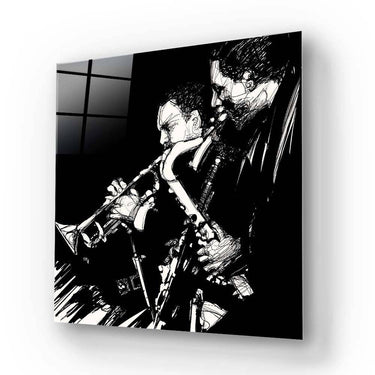 Black and white glass art panel featuring jazz musicians with trumpet and saxophone, ideal for modern interiors.