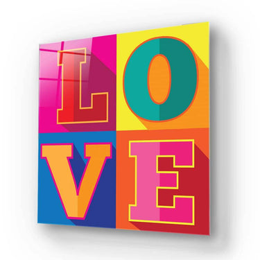 Vibrant 'LOVE' wall art in bold colors, modern decorative glass panel for home or office