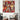 Vibrant musical instruments wall art with guitars, saxophone, accordion in bold red and gold tones