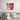 Vibrant geometric lion wall art above modern bed in stylish bedroom decor