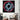 Abstract circular wall art with red and blue textured glass, displayed in modern living room