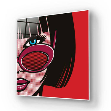 Pop art glass wall art with bold red and black design, featuring stylized woman's face and sunglasses