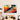 Abstract wall art with bold geometric shapes and warm tones, enhancing modern dining room decor