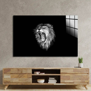 Black and white lion roaring wall art above wooden TV console in modern living room