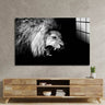 Black and white lion portrait wall art above wooden TV unit in modern living room
