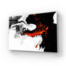 Bespoke decorative glass art with bold black, white, and red abstract swirls for modern interiors