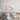Pastel abstract wall art above modern bed, featuring soft 3D spheres in pink and blue tones for bedroom decor
