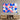 Geometric abstract art print with blue, pink, and white circles on modern living room wall