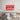 Red framed glass art with eye cutout above bed, modern bedroom decor