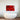 Vibrant red abstract glass art above modern freestanding bathtub in luxury bathroom