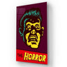 Bespoke decorative glass art with horror movie poster design, featuring bold yellow and red graphics on dark background