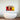Pop art glass wall art with 'BLA BLA BLA' text above modern bathtub, decorative glass for luxury bathrooms