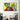 Pop art zombie giving thumbs up on wall, bold yellow background, modern living room decor