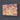 Bespoke decorative glass panel with vibrant orange and blue abstract pattern, ideal for luxury interiors.