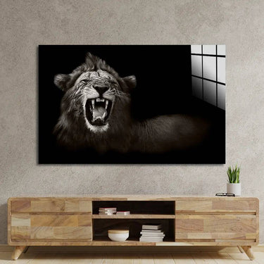 Black and white lion roar wall art above wooden TV unit in modern living room