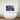Bespoke decorative glass wall art with blue and gold abstract design above modern bathtub