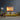 Autumn forest wall art above yellow sofa in modern living room