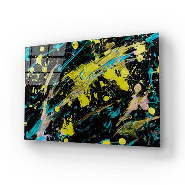 Vibrant abstract glass art with bold yellow, teal, and black splashes, ideal for modern interior decor.