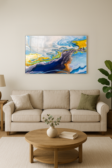 Abstract galaxy wall art with blue, yellow, and white swirls above beige sofa in modern living room