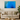 Modern beige living room with blue abstract ice cave wall art, sofa, wooden coffee table, and green plant