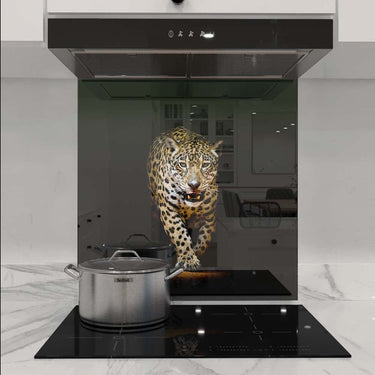 Bespoke kitchen glass splashback featuring a vivid leopard design, enhancing modern luxury interiors.