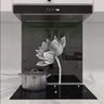 Bespoke decorative glass splashback with lotus flower design in modern kitchen