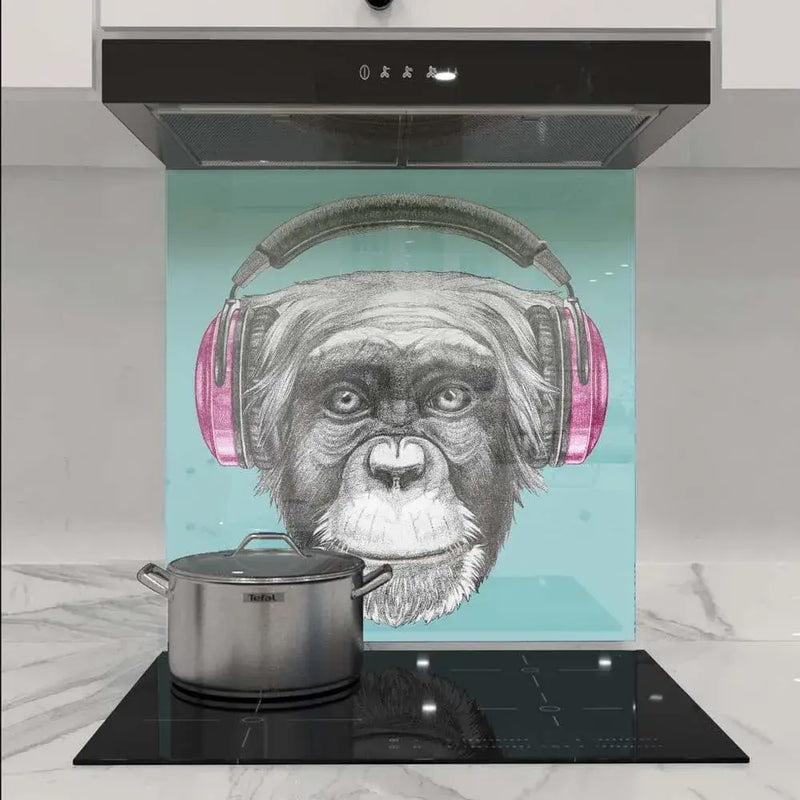 Custom kitchen splashback with monkey wearing pink headphones, decorative glass art for modern home