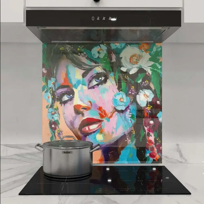 Vibrant floral face art glass splashback in modern kitchen, bespoke decorative glass feature