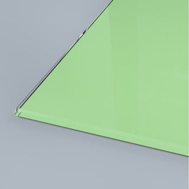 Green tinted architectural glass panel with polished edge, ideal for modern interior design and bespoke installations.