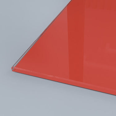 Vibrant red architectural glass panel with polished edge, ideal for modern interior design and bespoke installations.