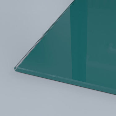 Teal architectural glass panel with polished edge, ideal for bespoke commercial or residential projects.