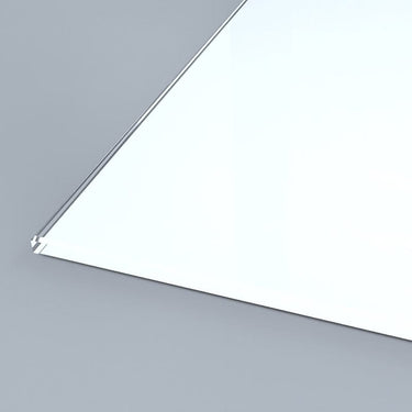 Bespoke architectural glass panel with sleek metal edge, ideal for modern commercial or luxury residential interiors.