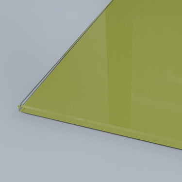Lime green architectural glass panel with polished edge, ideal for bespoke commercial or residential projects.