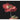 Vibrant red poppy flower with delicate petals and dark background, showcasing natural beauty and texture.
