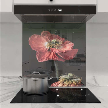 Bespoke floral glass splashback with pink poppy design in modern kitchen, featuring decorative glass and LED backlit effect.