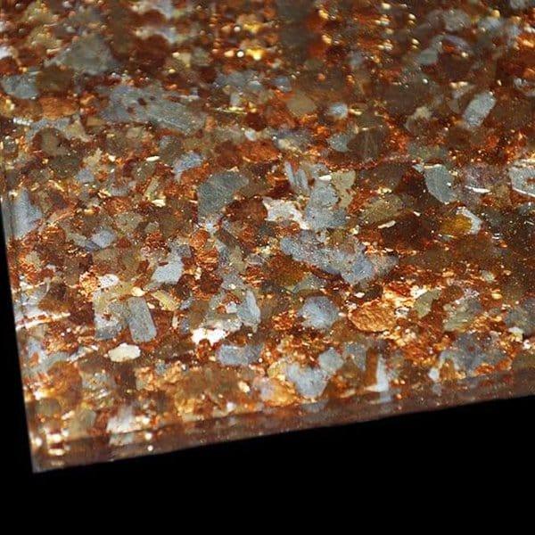 Luxury decorative glass with shimmering gold and silver flecks for bespoke architectural projects