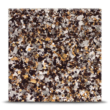 Luxury decorative glass with black, white, and gold speckled pattern for bespoke architectural projects