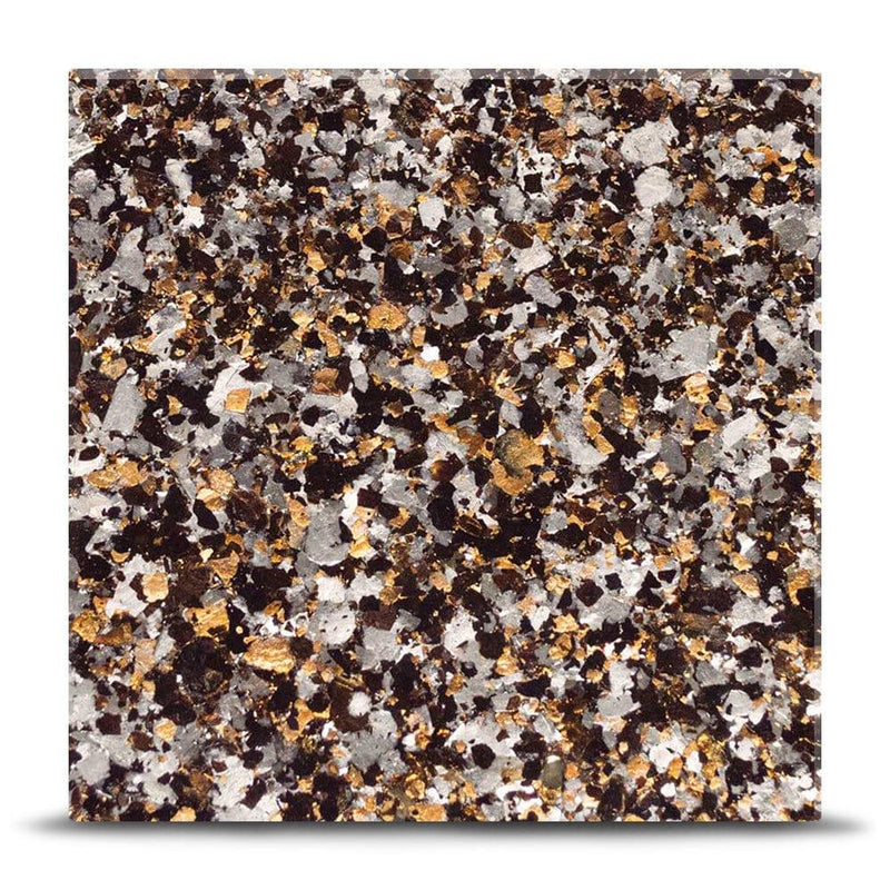 Luxury decorative glass with black, white, and gold speckled pattern for bespoke architectural projects
