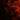 Red smoke swirls against black background, abstract atmospheric effect