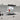 Bespoke decorative glass splashback with London scene, red umbrellas, in modern white kitchen