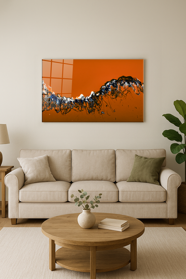 Modern living room with beige sofa, round wooden coffee table, and abstract orange and black wall art