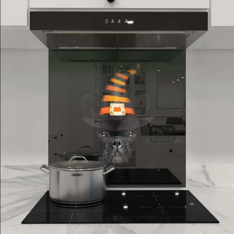 Custom kitchen glass splashback with Halloween dog graphic, modern induction cooktop, sleek range hood