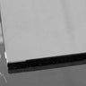 Close-up of polished glass edge with black interlayer, showcasing precision craftsmanship for architectural glass installations.