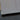 Close-up of sleek, polished glass edge with black accent, ideal for modern balustrades or decorative panels.