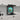 LED backlit glass splashback with teal floral design in modern kitchen